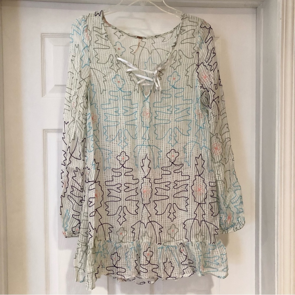 Free People cover up embroidered and semi sheer fabric size Medium